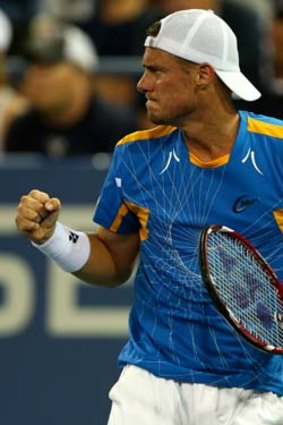 Come on: Lleyton Hewitt celebrates winning a point.