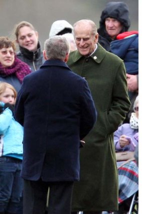 Prince Philip smiles as he leaves St Mary Magdalene Church after attending the New Year's Day church service.