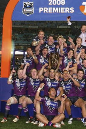 Melbourne Storm players celebrate after winning the 2009 grand final.
