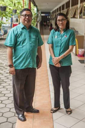 Lily Halim (right) headmaster of Kalam Kudus Primary School (right) with Gerald Siregar. The primary school is one many in Yogyakarta that is using Australian teaching methods to boost students' performance. 