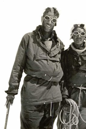 Edmund Hillary and Tenzing Norgay return to the advance base after ascending Everest.