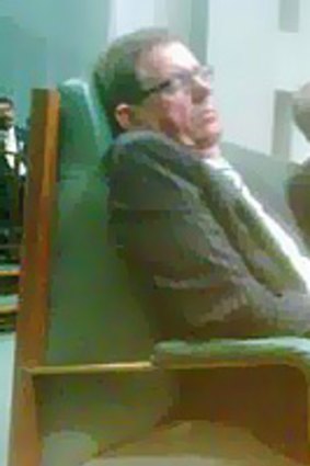 The camera-phone image of a sleeping Peter Slipper.