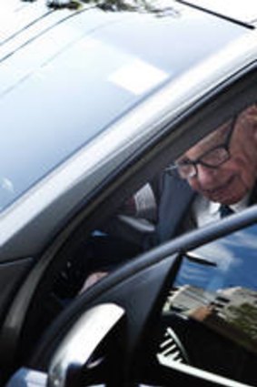 Rupert Murdoch leaves the News Limited offices in Surry Hills, Sydney.