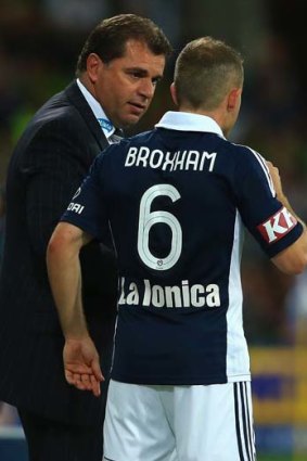 Ange Postecoglou talks to Leigh Broxham during the round nine A-League match against Perth Glory.
