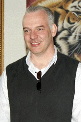 Neil Heywood, the murdered British business consultant, at an art gallery in Beijing, 2011