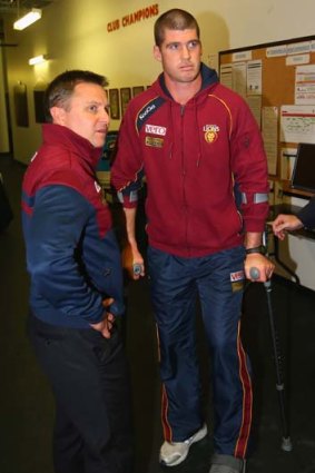 Uncertain future ... Jonathan Brown on crutches after being injured against St Kilda.
