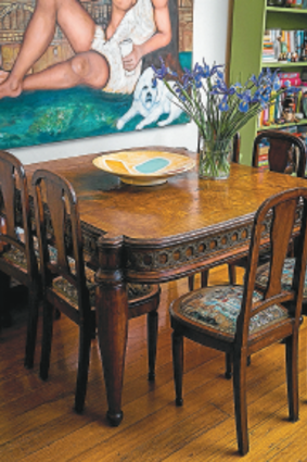 Purchased on eBay, this walnut dining table is an 18th-century French design. 