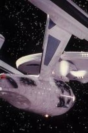 Dashing and retro: The USS Enterprise takes on a foe. 