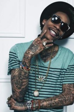 Wiz Khalifa has broken streaming records with his Paul Walker tribute 'See You Again'.