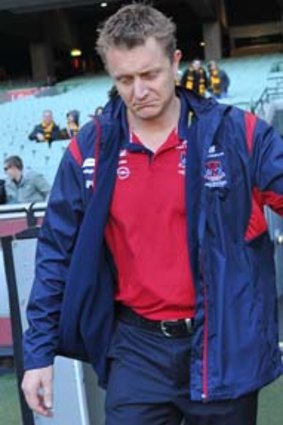 It was another grim day at the office on Sunday for Melbourne coach Mark Neeld as the Demons lost by 95 points.