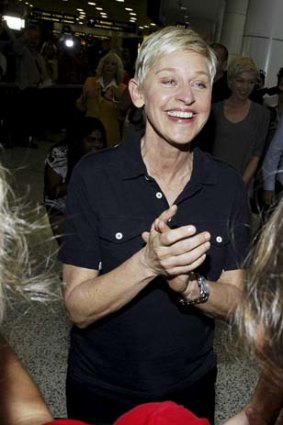 Ellen DeGeneres greets fans on arrival to Sydney.