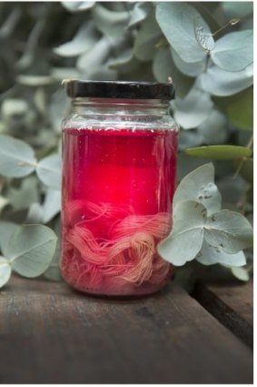 Thread dyeing in a jar.
