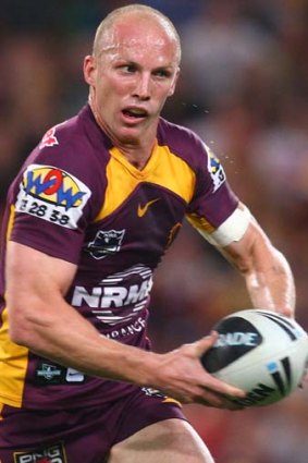 Darren Lockyer plays on after suffering the facial knock.