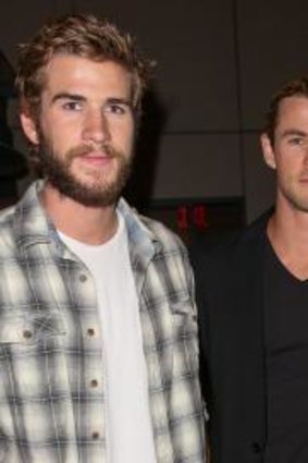 Brotherly love: Chris Hemsworth, centre, has a tight relationship with siblings Liam, left, and Luke - the older pair reportedly stepped in when Liam was having issues with Miley Cyrus.