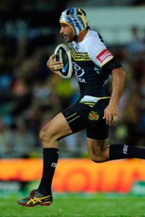 Leaps ahead: Johnathan Thurston and the Cowboys.