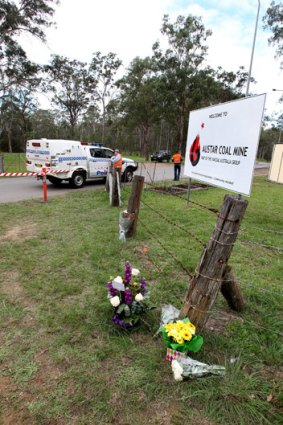 Tragedy: Flowers mark the deaths of two men at the Hunter Valley mine.
