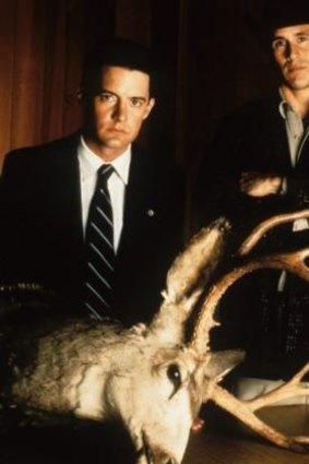 Kyle MacLachlan as FBI Special Agent Dale Cooper and Michael Ontkean as the town's sheriff, Harry S. Truman.