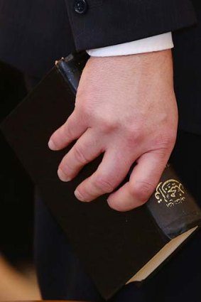 Ed Husic, with the copy of the Koran with which he was sworn in as a parliamentary secretary.