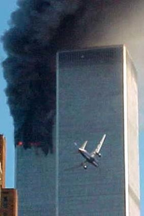 A jet airliner flies into one of the World Trade Center towers in New York in 2001.