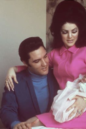 Lisa Marie Presley as a newborn in 1968 with her parents, Elvis and Priscilla.