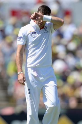 James Anderson wipes his brow.