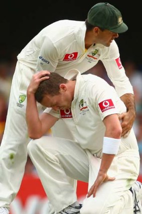 Ouch &#8230;Ricky Ponting consoles Peter Siddle.