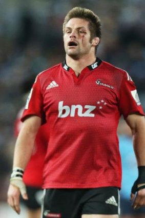 Bloodied and beaten: Crusaders veteran Richie McCaw after conceding the crucial late penalty to the Waratahs.