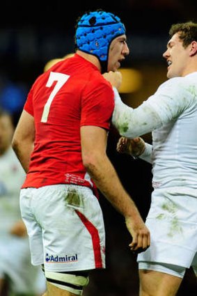Challenger: Justin Tipuric, left,  faces off with  Alex Goode during the Six Nations decider.