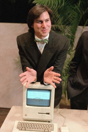 The way we were: Steve Jobs shows shareholders the first Mac, in 1984.