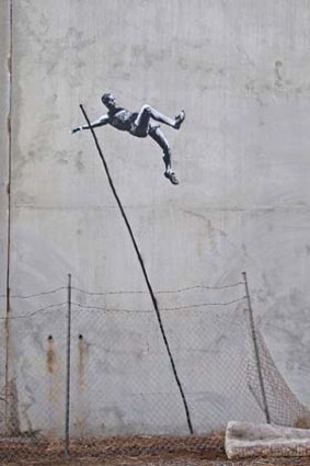 Banksy's pole vaulting stencil.