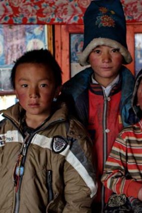 Home truths: Nomad children who have settled.