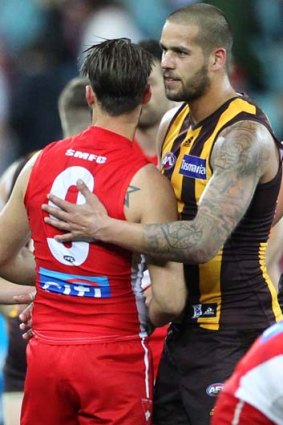 Lance Franklin shakes hands with Nick Malceski after a Hawthorn win over the Swans, August 30.