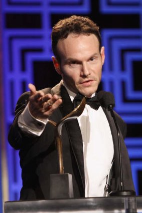 Writer Chris Terrio accepts the Writers Guild Award for outstanding script in an adapted screenplay for <i>Argo</i>.