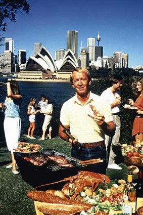 Paul Hogan adds another shrimp to the BBQ.