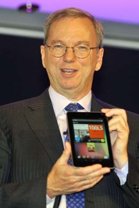 Eric Schmidt shows off the Google Nexus 7 tablet.