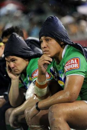 Shaun Berrigan and Josh Papalii watch on forlornly during the 40-0 round 13 drubbing against Wests Tigers.