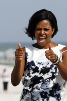 Michelle Obama  ... lavished praise on the NAACP.
