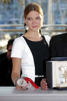 All smiles: Lea Seydoux (left), director Abdellatif Kechiche and Adele Exarchopoulos in Cannes.