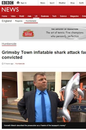Kenneth Meech outside the court with the inflatable shark as reported by the BBC.