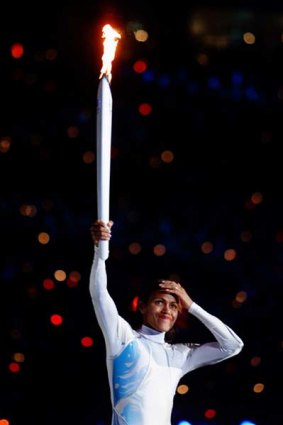 Torch song ... the choice of Cathy Freeman to light the flame was kept secret until the end.