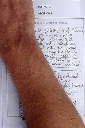 Stand-off ... the handwritten note by an unidentified British police officer, which outlines that "Assange to be arrested under all circumstances"  if he comes out of the embassy.