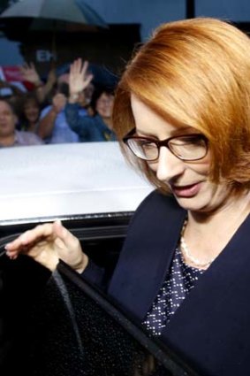 Prime Minister Julia Gillard leaves the University of Western Sydney on Sunday.