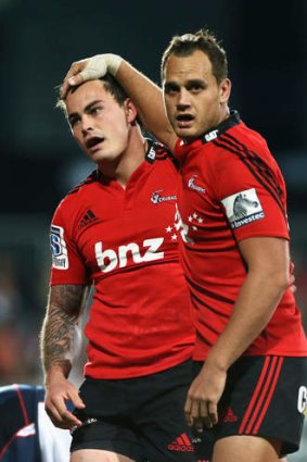 Zac Guildford with Israel Dagg of the Crusaders.