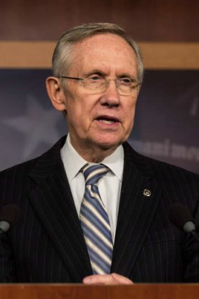 Senate Majority Leader Senator Harry Reid speaks at a press conference after successfully pushing a bipartisan bill through the US Senate to restart the government and raise the debt limit.