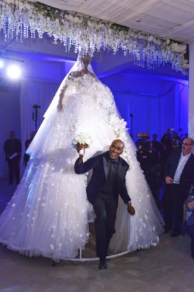 Preston Bailey emerged from a giant bridal gown at his wedding.