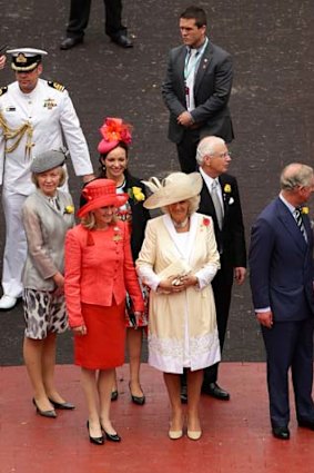 Prince Charles and Camilla, Duchess of Cornwall are greeted at Flemington Racecourse.