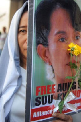 A portrait of Aung San Suu Kyi held by an activist from the Free Burma Coalition.