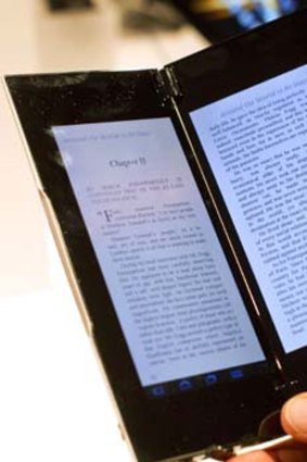 Reading a book on the foldable Sony Tablet P.
