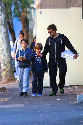 The sum of Russ: Crowe with sons (from left) Charlie, 19, and Tennyson, 8, in Sydney. 