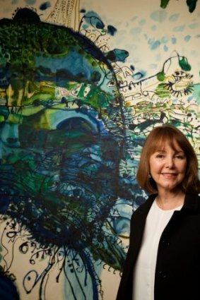Artist biographer: Darleen Bungey (pictured alongside John Olsen's <i>Five bells</i> 1963 at the Art Gallery of NSW) was a good match for her larger-than-life subject. 
